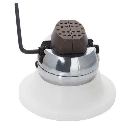 Mini engraving block with rubber base and adjustable jaws for jewelry engraving.