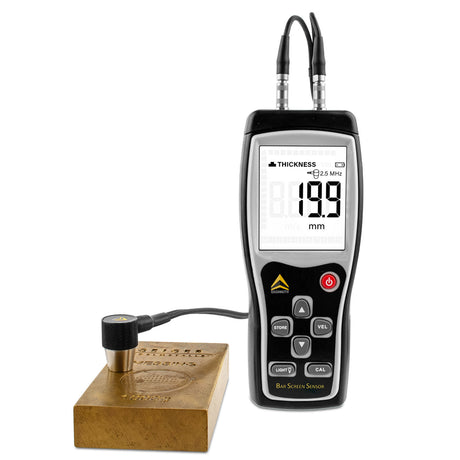 A device called BarScreenSensor, which is used for testing the authenticity of precious metal bars, along with a digital display showing a measurement, and a metal ingot beside it.