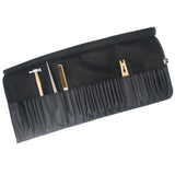 Black roll-up tool pouch with multiple pockets for storing goldsmith and jewellery-making tools (tools not included).